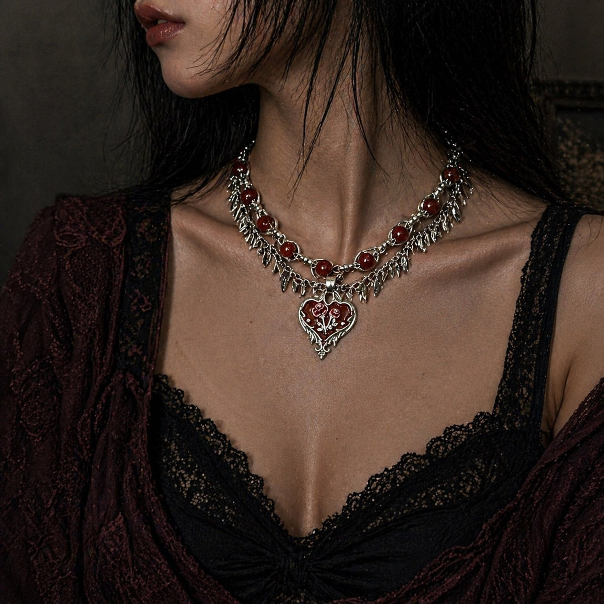 Model wearing the gothic red heart rose layered necklace with black lace